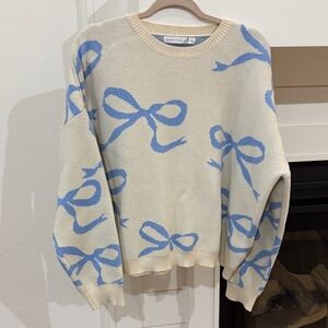 Altar’d State Blue Bow Pattern Cream Sweater